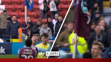 Flemming goads Ewood Park with Burnley shirt on Blackburn corner flag! 