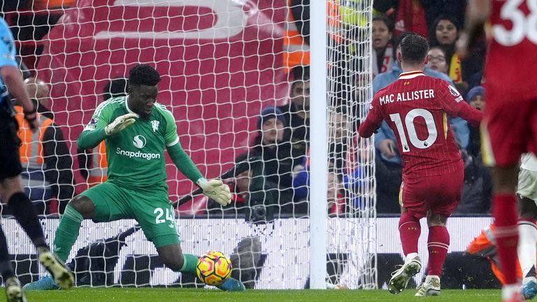 Liverpool's Alexis Mac Allister sees a shot saved by Man Utd's Andre Onana