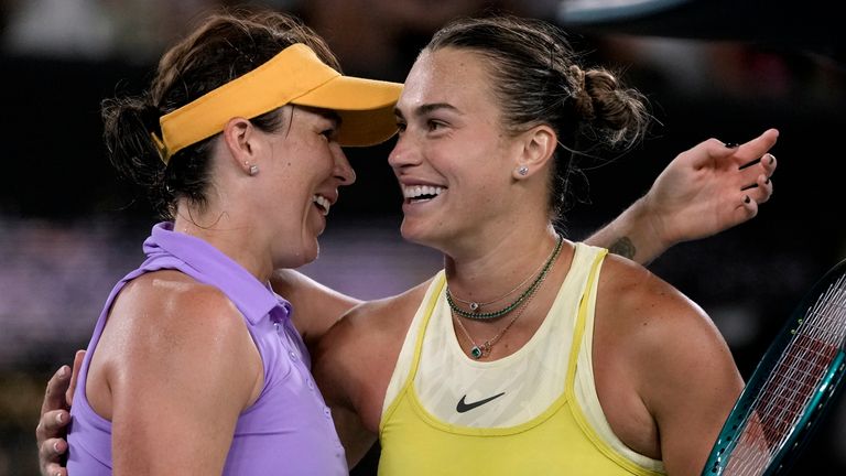 Aryna Sabalenka, right, of Belarus, is congratulated by Anastasia Pavlyuchenkova of Russia following their quarterfinal match at the Australian Open tennis championship in Melbourne, Australia, Tuesday, Jan. 21, 2025. (AP Photo/Ng Han Guan)