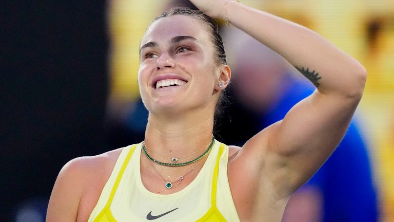 Aryna Sabalenka of Belarus reacts after defeating Sloane Stephens of the U.S. in their first round match at the Australian Open tennis championship in Melbourne, Australia, Sunday, Jan. 12, 2025. (AP Photo/Vincent Thian)