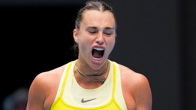 Aryna Sabalenka of Belarus reacts after winning a point against Jessica Bouzas Maneiro of Spain during their second round match at the Australian Open tennis championship in Melbourne, Australia, Wednesday, Jan. 15, 2025. (AP Photo/Vincent Thian)