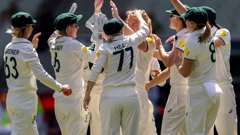 Australia celebrate the fall of a wicket during day one of the Women's Ashes day-night Test