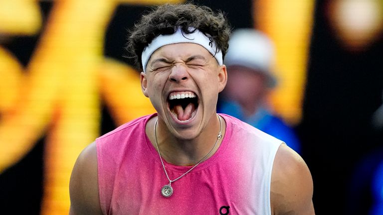 Ben Shelton of the U.S. celebrates after defeating Lorenzo Sonego of Italy in their quarterfinal match at the Australian Open tennis championship in Melbourne, Australia, Wednesday, Jan. 22, 2025. (AP Photo/Manish Swarup)