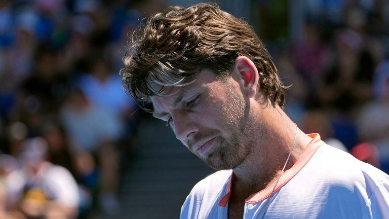 Cameron Norrie of Britain reacts during his first-round loss to Matteo Berrettini of Italy at the Australian Open tennis tournament in Melbourne, Australia, Tuesday, January 14, 2025. (AP Photo/Asanka Brendon Ratnayake)