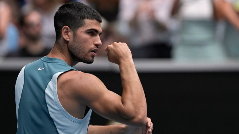 Carlos Alcaraz of Spain reacts after defeating Yoshihito Nishioka of Japan during their second round match at the Australian Open in Melbourne, Australia, Wednesday, January 15, 2025 . (AP Photo/Ng Hanguan)