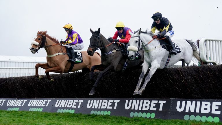 Copperhead (far) is in action in the Veterans' Chase at Sandown