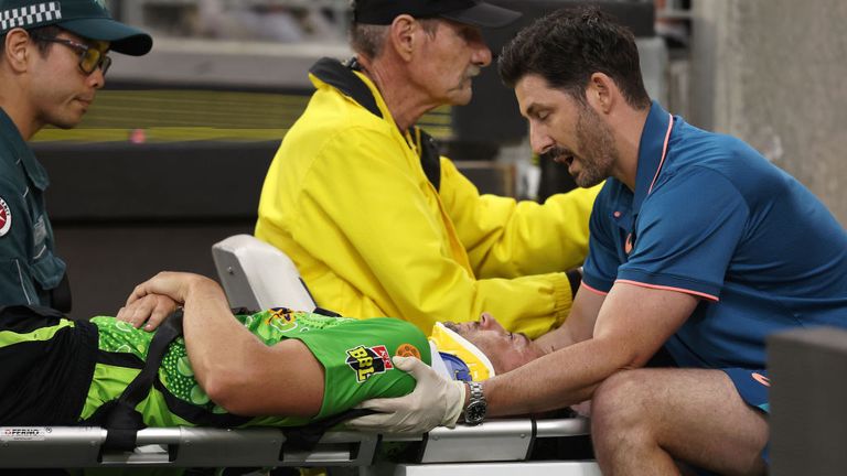 Daniel Sams was taken off in a stretcher after the collision but is 'conscious and talking'. Sydney Thunder confirmed