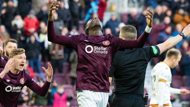 EDINBURGH, SCOTLAND - JANUARY 02: Hearts' Musa Drammeh reacts as there is a VAR check following his goal during a William Hill Premiership match between Heart of Midlothian and Motherwell at Tynecastle Park, on January 02, 2025, in Edinburgh, Scotland.  (Photo by Mark Scates / SNS Group)