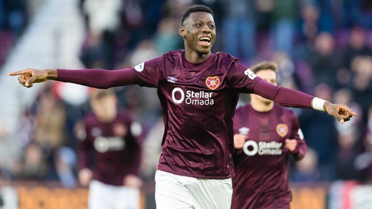 EDINBURGH, SCOTLAND - JANUARY 02: Hearts' Musa Drammeh celebrates scoring to make it 1-0 during a William Hill Premiership match between Heart of Midlothian and Motherwell at Tynecastle Park, on January 02, 2025, in Edinburgh, Scotland.  (Photo by Mark Scates / SNS Group)