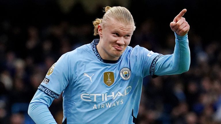 Erling Haaland celebrates scoring Man City's second goal