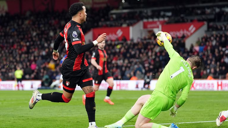 Justin Kluivert's lifted shot is kept out by Pickford