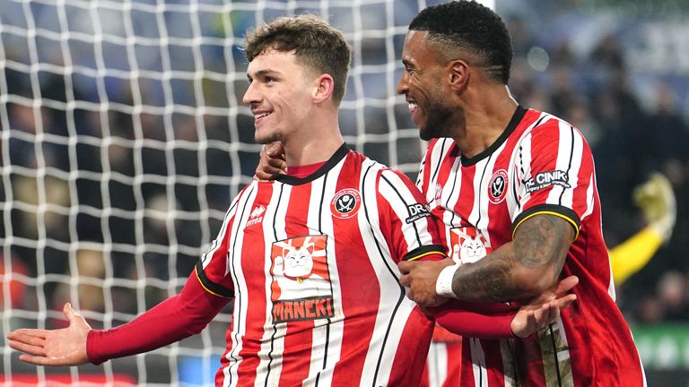 Sheffield United's Harrison Burrows (left) celebrates scoring their second goal against Swansea