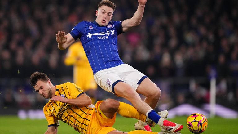 Brighton and Hove Albion's Joel Veltman (left) and Ipswich Town's Liam Delap battle for the ball