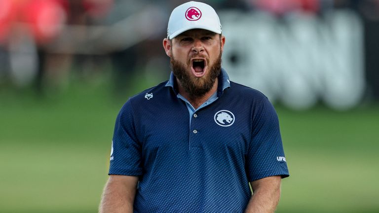 English player Tyrrell Hatton celebrates after putting in the 18th hole on day four of the 2025 Dubai Desert Classic golf tournament at Emirates Golf Club in Dubai on January 19, 2025. (Photo by Fadel Sina/AFP)