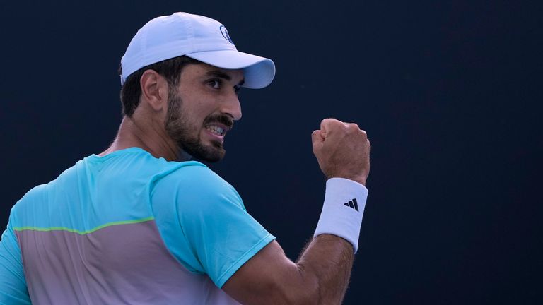 Hadi Habib of Lebanon reacts after winning a point against Bo Yunchaoketi of China during a first round match at the Australian Open tennis tournament in Melbourne, Australia, Sunday, January 12, 2025. (AP Photo/Asanka Brendon Ratnayake)