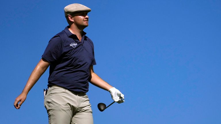 Harry Hall watches his tee shot on the 14th hole during the second round of the Sentry golf event, Friday, Jan. 3, 2025, at Kapalua Plantation Course in Kapalua, Hawaii. (AP Photo/Matt York)