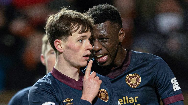 DUNDEE, SCOTLAND - JANUARY 05: Hearts' James Penrice (L) celebrates by shushing Dundee United fans after scoring to make it 1-0 with Musa Drammeh during a William Hill Premiership match between Dundee United and Heart of Midlothian at The CalForth Construction Arena at Tannadice Park, on January 05, 2025, in Dundee, Scotland. (Photo by Ewan Bootman / SNS Group)