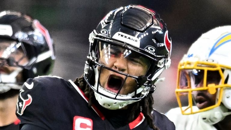 Houston Texans quarterback C.J. Stroud (7) reacts after a first down in the second quarter against the Los Angeles Chargers during an NFL football wild card playoff game, Saturday, Jan. 11, 2025, in Houston. (AP Photo/Maria Lysaker)