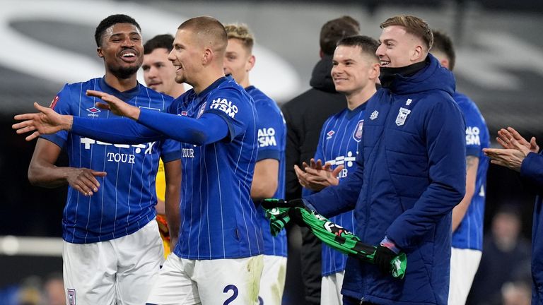 Ipswich Town players celebrating a win at full-time against Bristol Rovers in the FA Cup. 