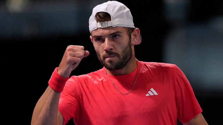 Jacob Fearnley of Britain reacts after winning a point against Arthur Cazaux of France during their second round match at the Australian Open tennis championship in Melbourne, Australia, Wednesday, Jan. 15, 2025. (AP Photo/Asanka Brendon Ratnayake)