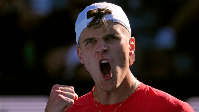 Jakub Mensik of the Czech Republic reacts after winning a point against Alejandro Davidovich Fokina of Spain during their third round match at the Australian Open tennis championship in Melbourne, Australia, Friday, Jan. 17, 2025. (AP Photo/Vincent Thian)