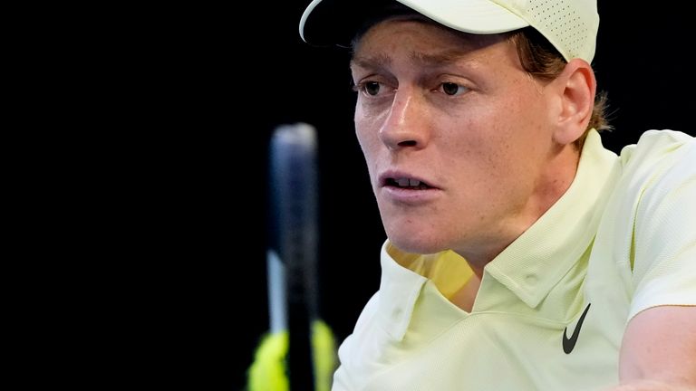 Jannik Sinner of Italy plays a backhand return to Alexander Zverev of Germany during the men's singles final at the Australian Open tennis championship in Melbourne, Australia, Sunday, Jan. 26, 2025. (AP Photo/Asanka Brendon Ratnayake)