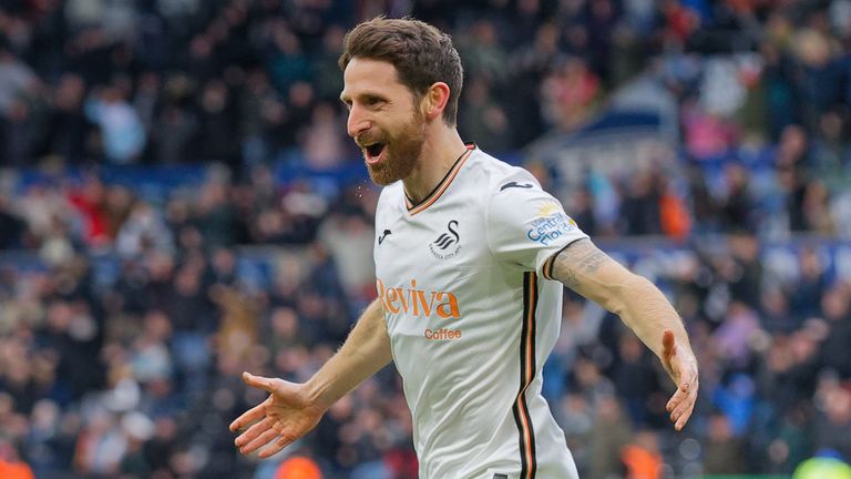 Joe Allen of Swansea City celebrates his late equaliser