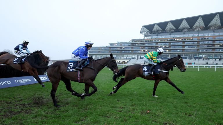 Jonbon clears away from Energumene in the Clarence House Chase at Ascot