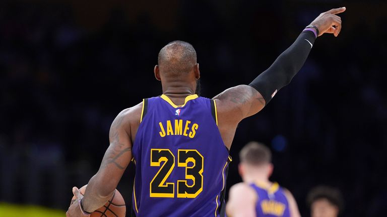 Los Angeles Lakers forward LeBron James gestures during the second half of an NBA basketball game against the Atlanta Hawks, Friday, Jan. 3, 2025, in Los Angeles. (AP Photo/Mark J. Terrill)