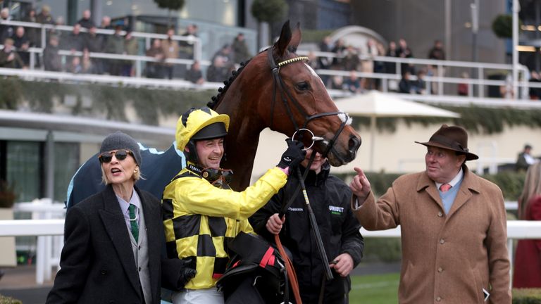 Lollamba with Nico de Boinville and Nicky Henderson after the win at Ascot