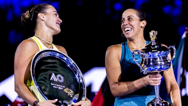 Madison Keys of the United States of America and Aryna Sabalenka of Belarus hold their respective trophies at the end of their Women's Singles Finals match of the 2025 Australian Open on January 25 2025, at Melbourne Park in Melbourne, Australia. (Photo by Jason Heidrich/Icon Sportswire) (Icon Sportswire via AP Images)