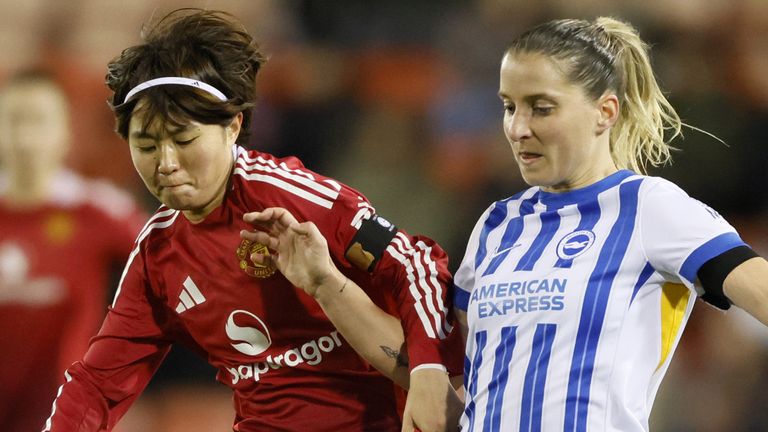 Manchester United's Hinata Miyazawa and Brighton's Jelena Cankovic battle for the ball 