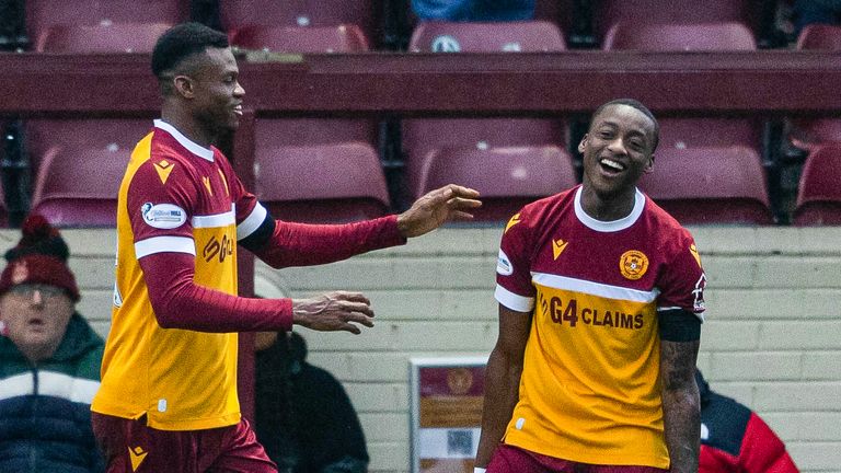 Motherwell's Tawanda Maswinhise (R) celebrates scoring to make it 2-0 