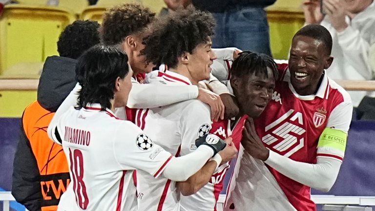 Monaco players celebrate the opening goal of their team during a Champions League opening phase soccer match between Monaco and Aston Villa at the Louis II stadium in Monaco, Tuesday, Jan. 21, 2025. (AP Photo/Laurent Cipriani)