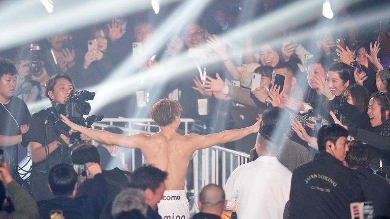 Fans cheer until the undisputed champion of Naoya Inoue leaves Ring after defending his united world titles by WBC, WBA, IBF and WBO Super-Bantam category