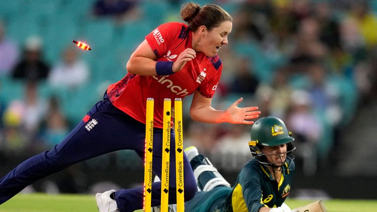 Australian Phoebe Litchfield, right, runs out as England's Nat Shaver-Brent reaches the stumps during the Ashes T20 women's cricket match in Sydney, Australia, Monday, January 20, 2025. (AP Photo/Rick Rycroft)