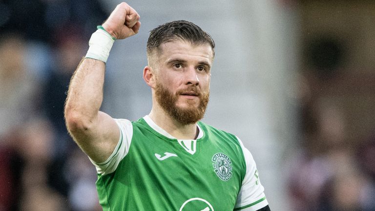 EDINBURGH, SCOTLAND - DECEMBER 26: Hibernian's Nicky Cadden celebrates as he assists Dwight Gayle who scores to make it 2-1 during a William Hill Premiership match between Heart of Midlothian and Hibernian at Tynecastle Park, on December 26, 2024, in Edinburgh, Scotland. (Photo by Paul Devlin / SNS Group)