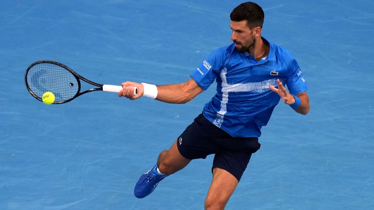 Novak Djokovic of Serbia makes a forehand return to Jiri Lehecka of the Czech Republic during their fourth round match at the Australian Open tennis championship in Melbourne, Australia, Sunday, Jan. 19, 2025. (AP Photo/Mark Baker)