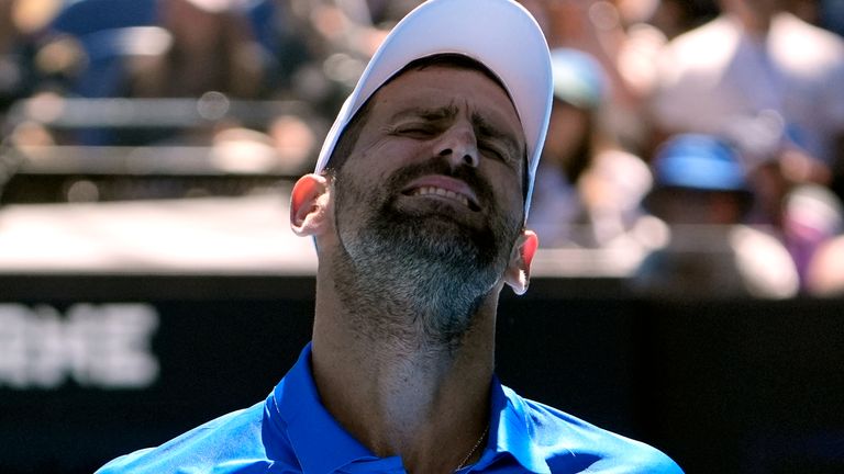 Novak Djokovic of Serbia reacts during his semifinal match against Alexander Zverev of Germany at the Australian Open tennis championship in Melbourne, Australia, Friday, Jan. 24, 2025. (AP Photo/Asanka Brendon Ratnayake)