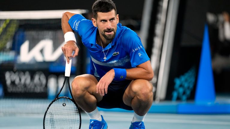 of Serbia reacts during his quarterfinal match against Carlos Alcaraz of Spain at the Australian Open tennis championship in Melbourne, Australia, Tuesday, Jan. 21, 2025. (AP Photo/Asanka Brendon Ratnayake)