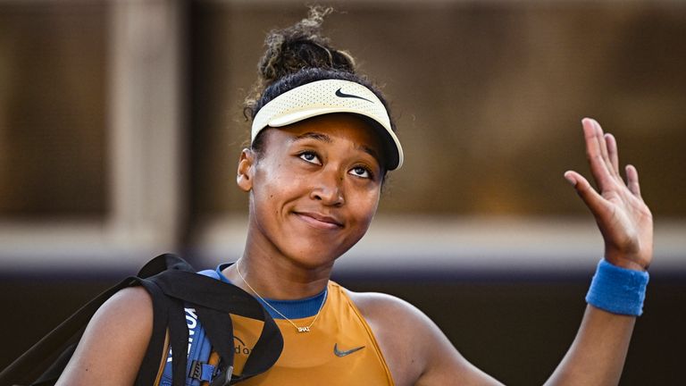 Naomi Osaka of Japan waves after winning over Alycia Parks of the U.S., in the semifinal of the ASB Classic tennis tournament at Manuka Doctor Arena in Auckland, New Zealand, Saturday, Jan. 4, 2025. (Alan Lee/Photosport via AP)..TOK402