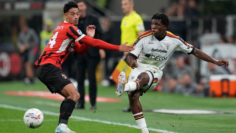 Patrick Dorgu de Lecce passes the balloon Tijjani Reijnders from Ball Nu Ac Milan during the series of Serie A between AC Milan and Lecce at the San Siro stadium in Milan, Italy, Friday September 27, 2024. (AP Photo / Antonio Calianni)