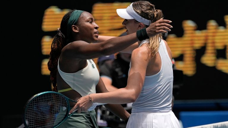 Paula Badosa of Spain is congratulated by Coco Gauff, left, of the U.S. following their quarterfinal match at the Australian Open tennis championship in Melbourne, Australia, Tuesday, Jan. 21, 2025. (AP Photo/Ng Han Guan)