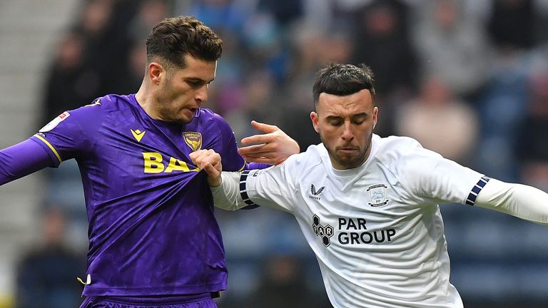 PRESTON, ENGLAND - JANUARY 4: Preston North End's Sam Greenwood battles with Oxford United's Ruben Rodrigues during the Sky Bet Championship match between Preston North End FC and Oxford United FC at Deepdale on January 4, 2025 in Preston, England. (Photo by Dave Howarth - CameraSport via Getty Images)                                                                                                                          