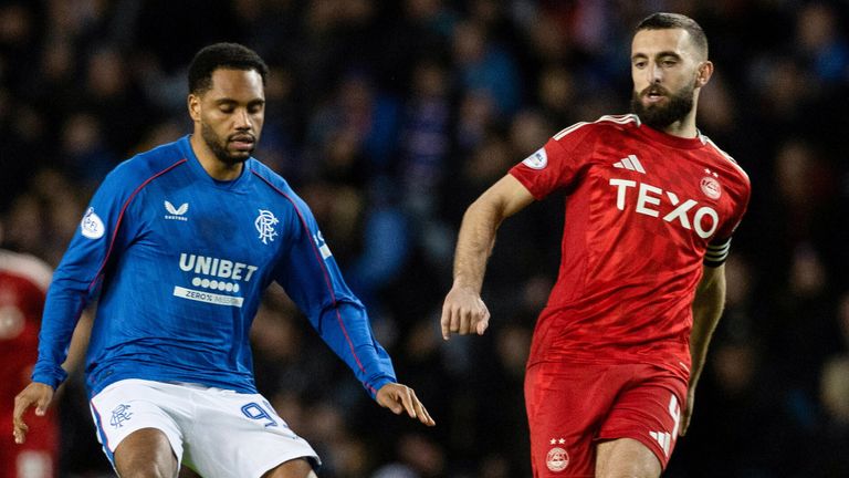 GLASGOW, SCOTLAND - JANUARY 15: Aberdeen's Graeme Shinnie (R) and Rangers' Danilo in action during a William Hill Premiership match between Rangers and Aberdeen at Ibrox Stadium, on January 15, 2025, in Glasgow, Scotland.  (Photo by Alan Harvey / SNS Group)