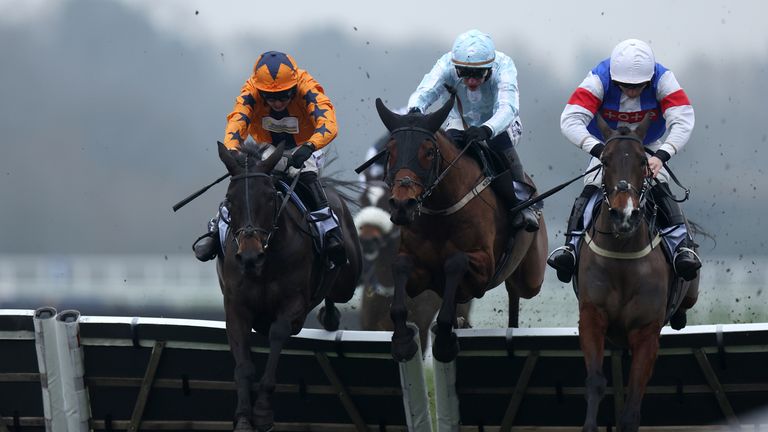 Don't Take Any Chances (left) edged favorite Cargesi in the BetMGM Mares' Hurdle at Ascot