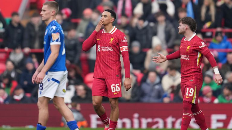 Liverpool's Trent Alexander-Arnold kisses the crowd after his goal