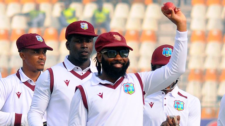 West Indies Jomel Warrican (centre) took seven wickets in the second innings on day three of the first Test