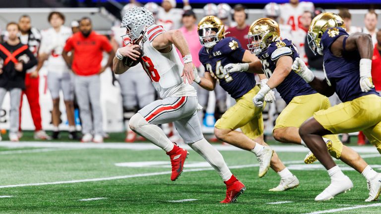 January 20, 2025: Ohio State quarterback Will Howard (18) during the College Football Playoff National Championship game between the Ohio State Buckeyes and the Ohio State University at Mercedes-Benz Stadium in Atlanta, Georgia The Notre Dame Irish run with the ball. John Mersits/CSM (Photo: John Mersits/Cal Sport Media) (Cal Sport Media via AP Images)