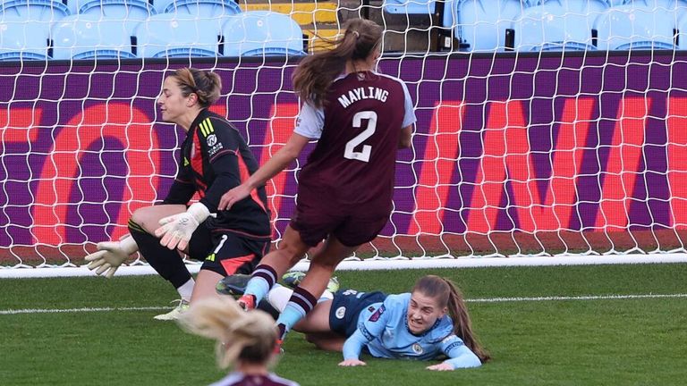 Kess Park slides in to score Man City's fourth goal at Villa Park